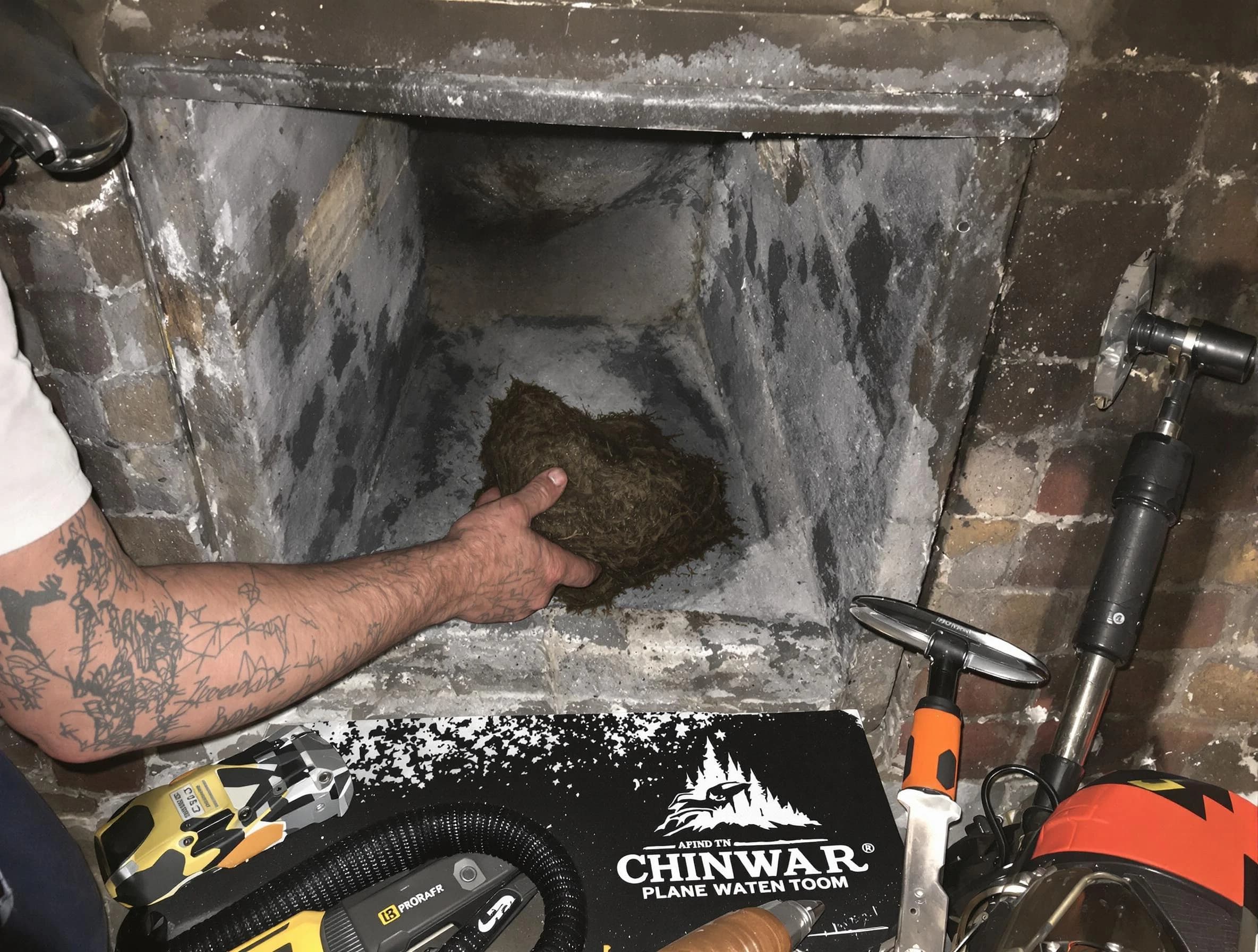 Edison Chimney Sweep safely removing debris and screening chimney in Edison, NJ
